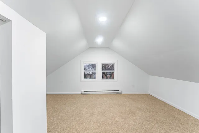 an empty room with a empty space and window