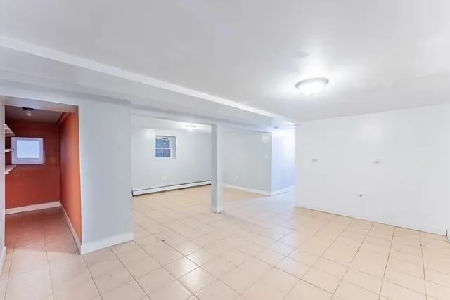 a bathroom with a toilet a sink and bathtub