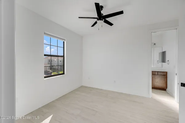 a view of an empty walk in closet