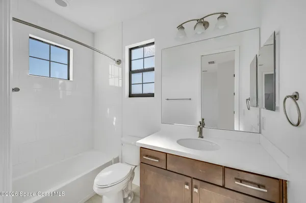 a utility room with cabinets
