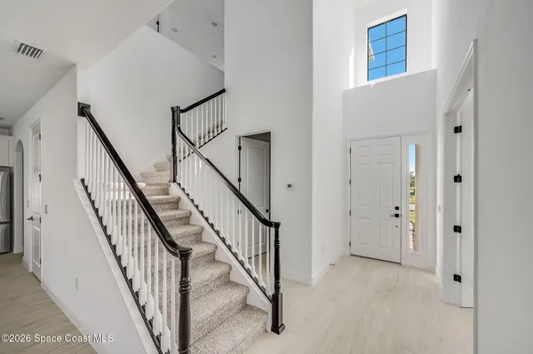 a view of an entryway with staircase