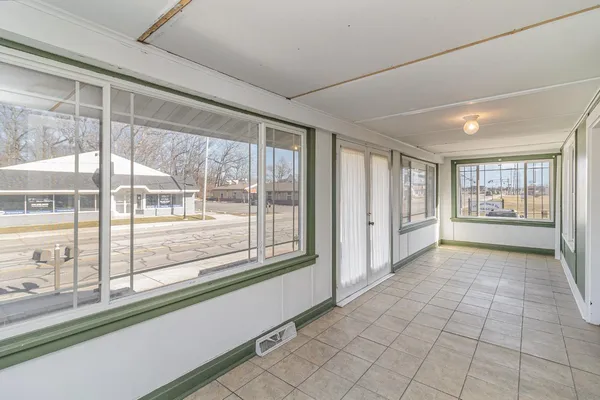 a view of gallery with windows