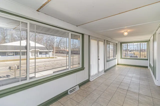 a view of gallery with windows
