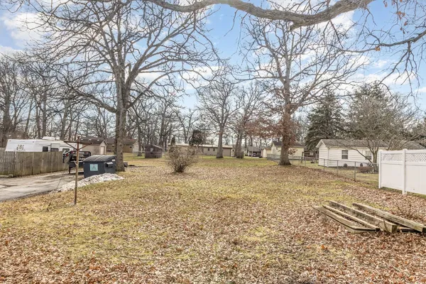 an aerial view of a house with a garden