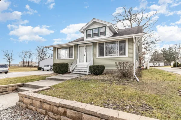 a front view of a house with entertaining space