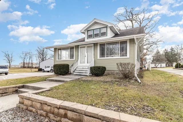 a front view of a house with entertaining space