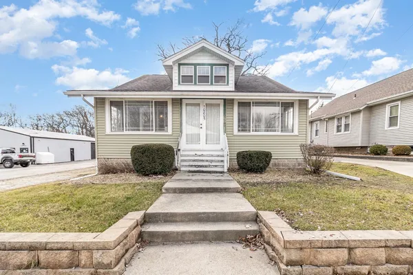 a view of livingroom with furniture wooden floor and window