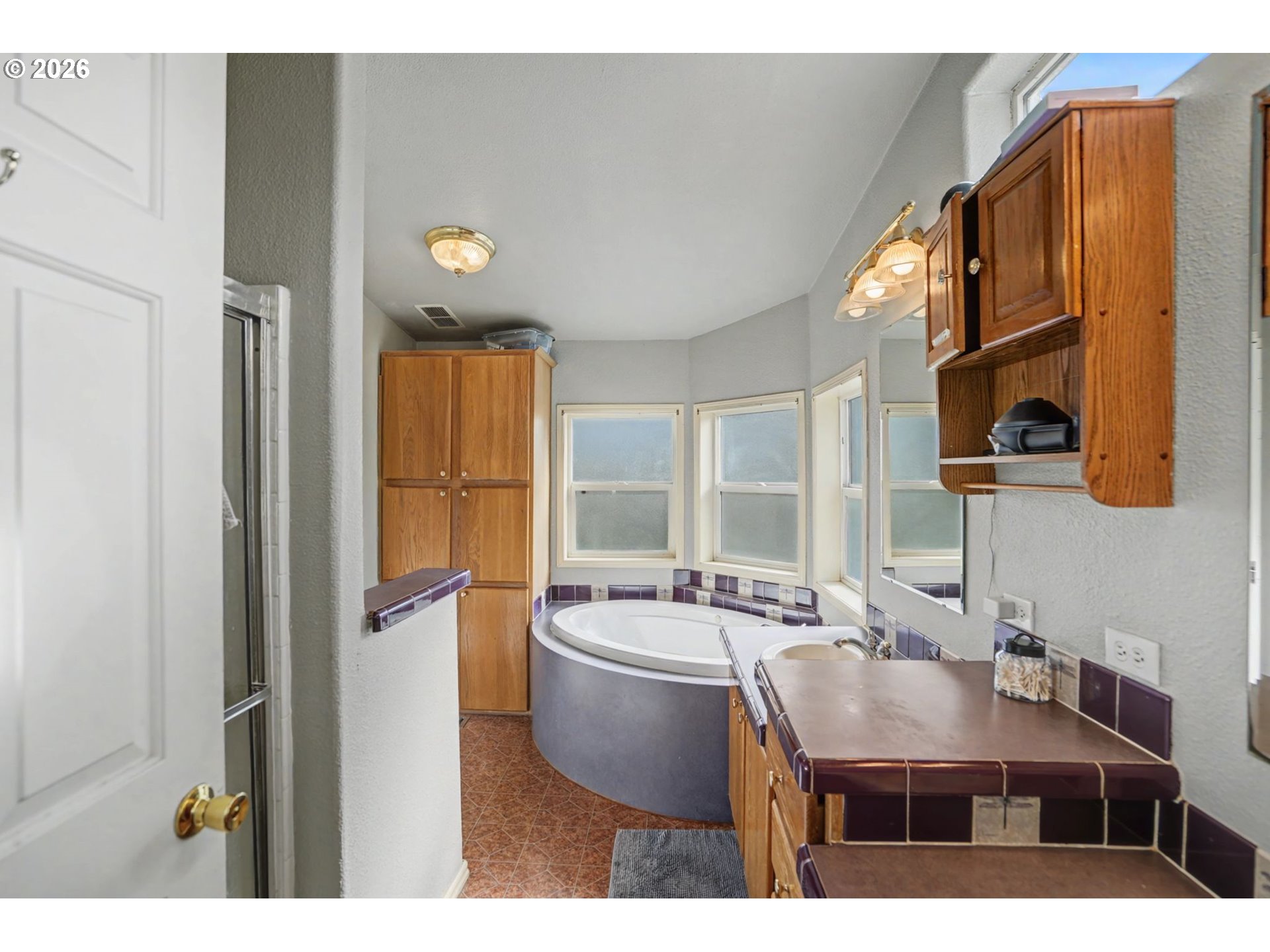 16310 Oakdale Road Dallas, OR 97338 - Photo 12 of 45 a bathroom with a sink and a mirror