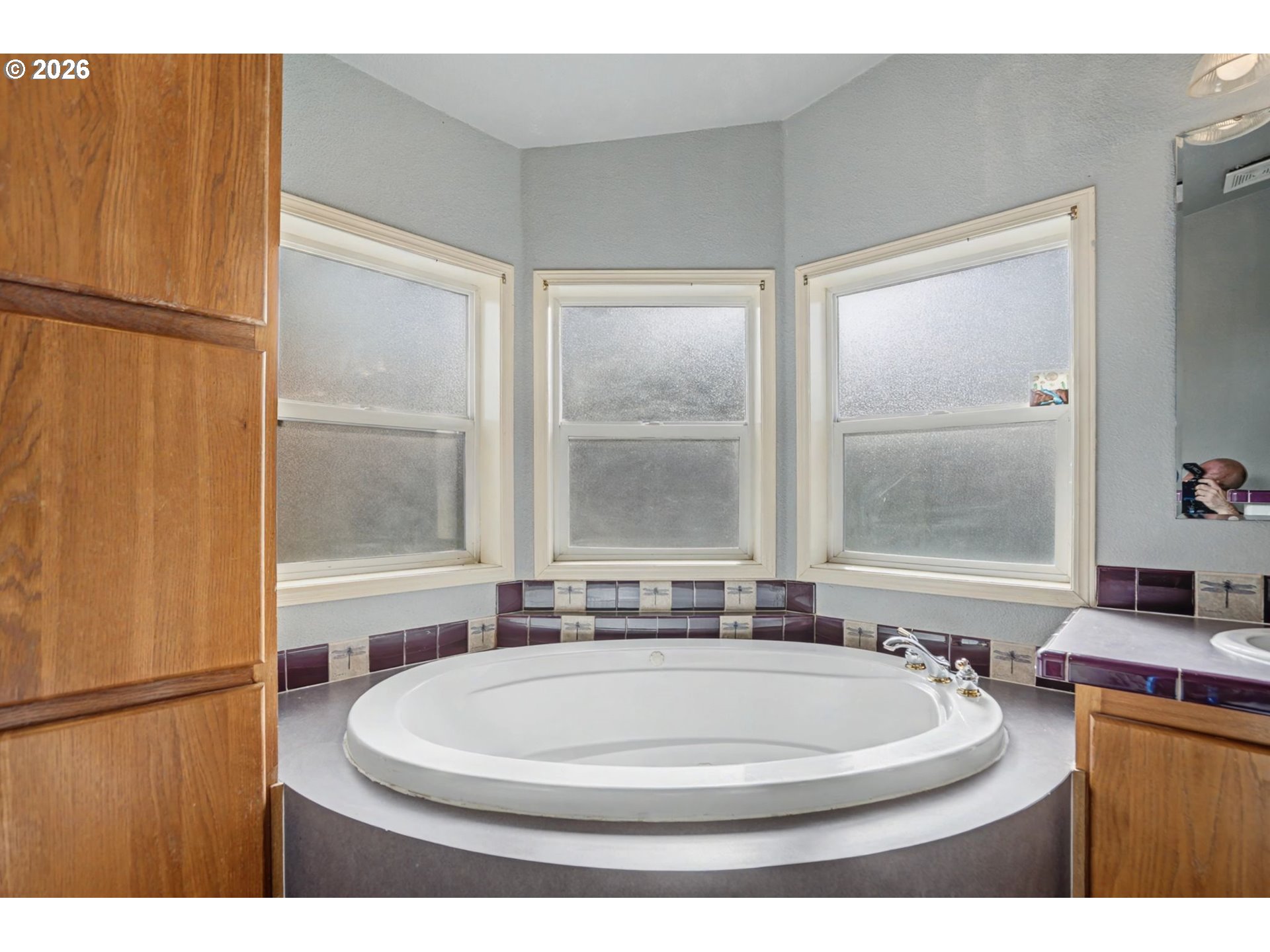 16310 Oakdale Road Dallas, OR 97338 - Photo 13 of 45 a bathroom with a sink and a bathtub