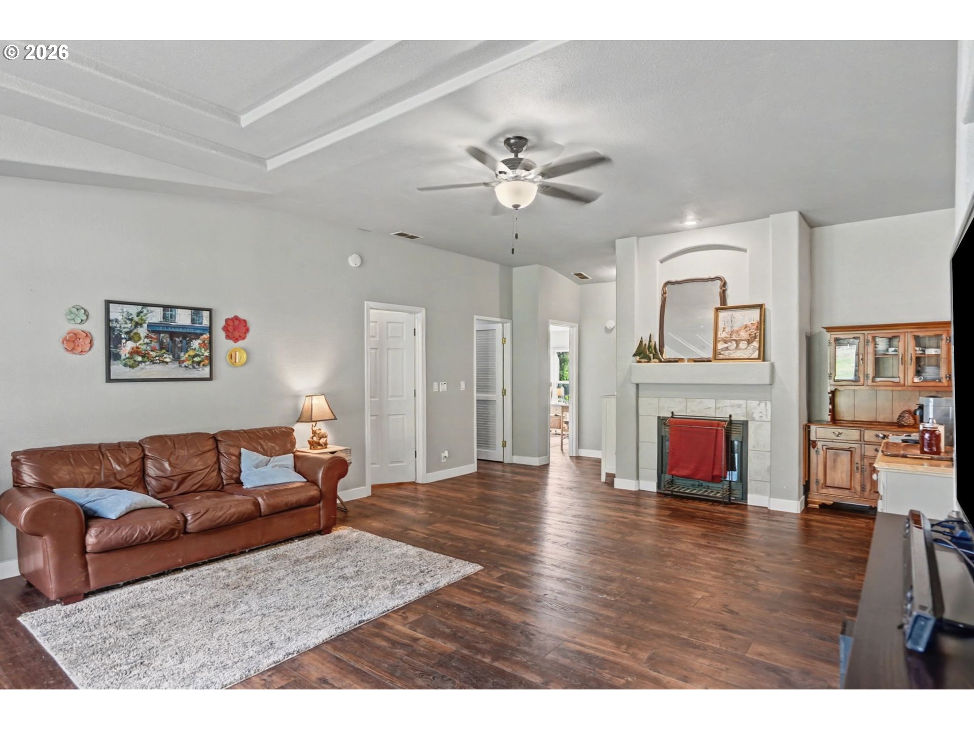 16310 Oakdale Road Dallas, OR 97338 - Photo 20 of 45 a living room with fireplace furniture and a wooden floor