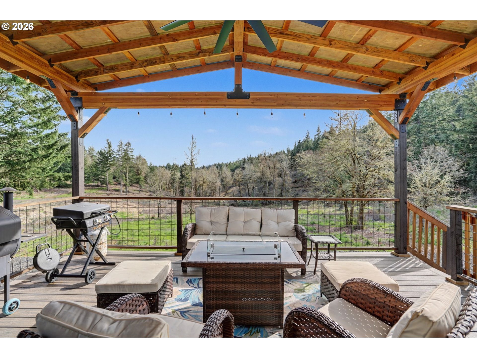 16310 Oakdale Road Dallas, OR 97338 - Photo 26 of 45 a view of balcony with couch and chairs