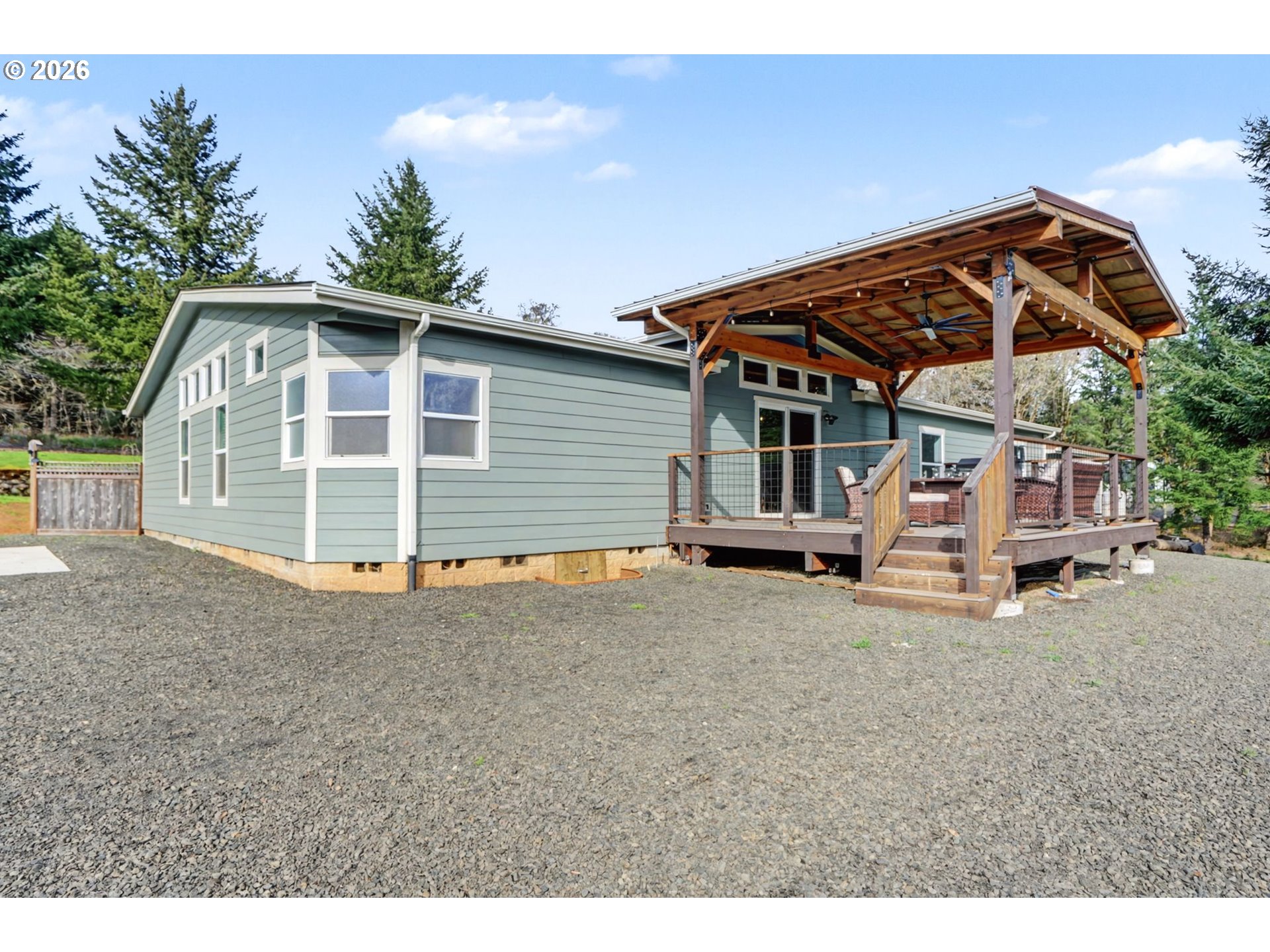 16310 Oakdale Road Dallas, OR 97338 - Photo 28 of 45 a view of a house with a backyard