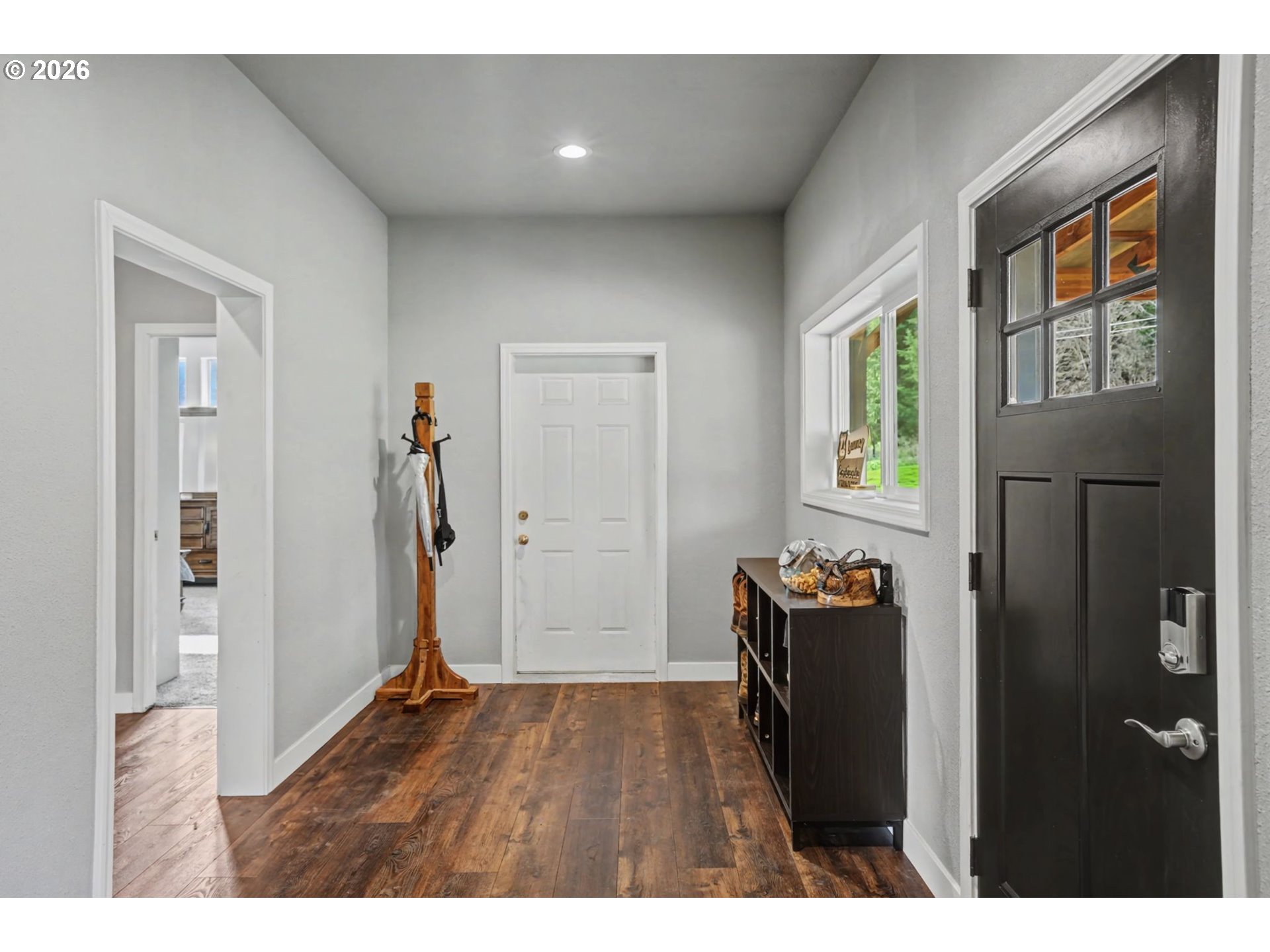 16310 Oakdale Road Dallas, OR 97338 - Photo 3 of 45 a view of an entryway with wooden floor