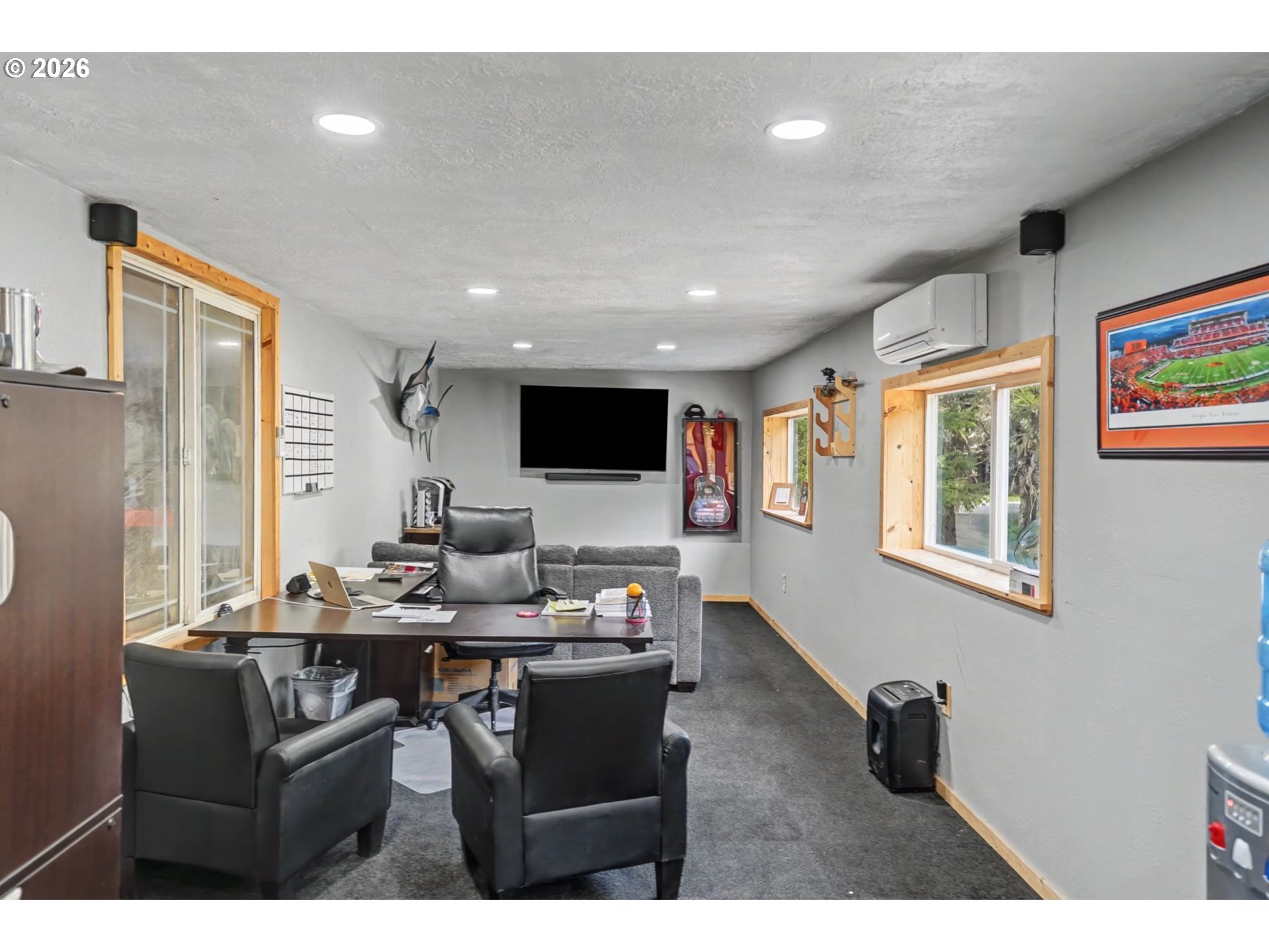 16310 Oakdale Road Dallas, OR 97338 - Photo 35 of 45 a living room with furniture and a flat screen tv