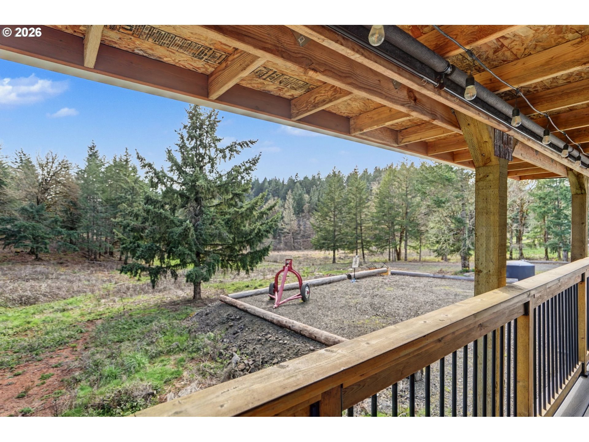 16310 Oakdale Road Dallas, OR 97338 - Photo 37 of 45 a view of a backyard with wooden fence