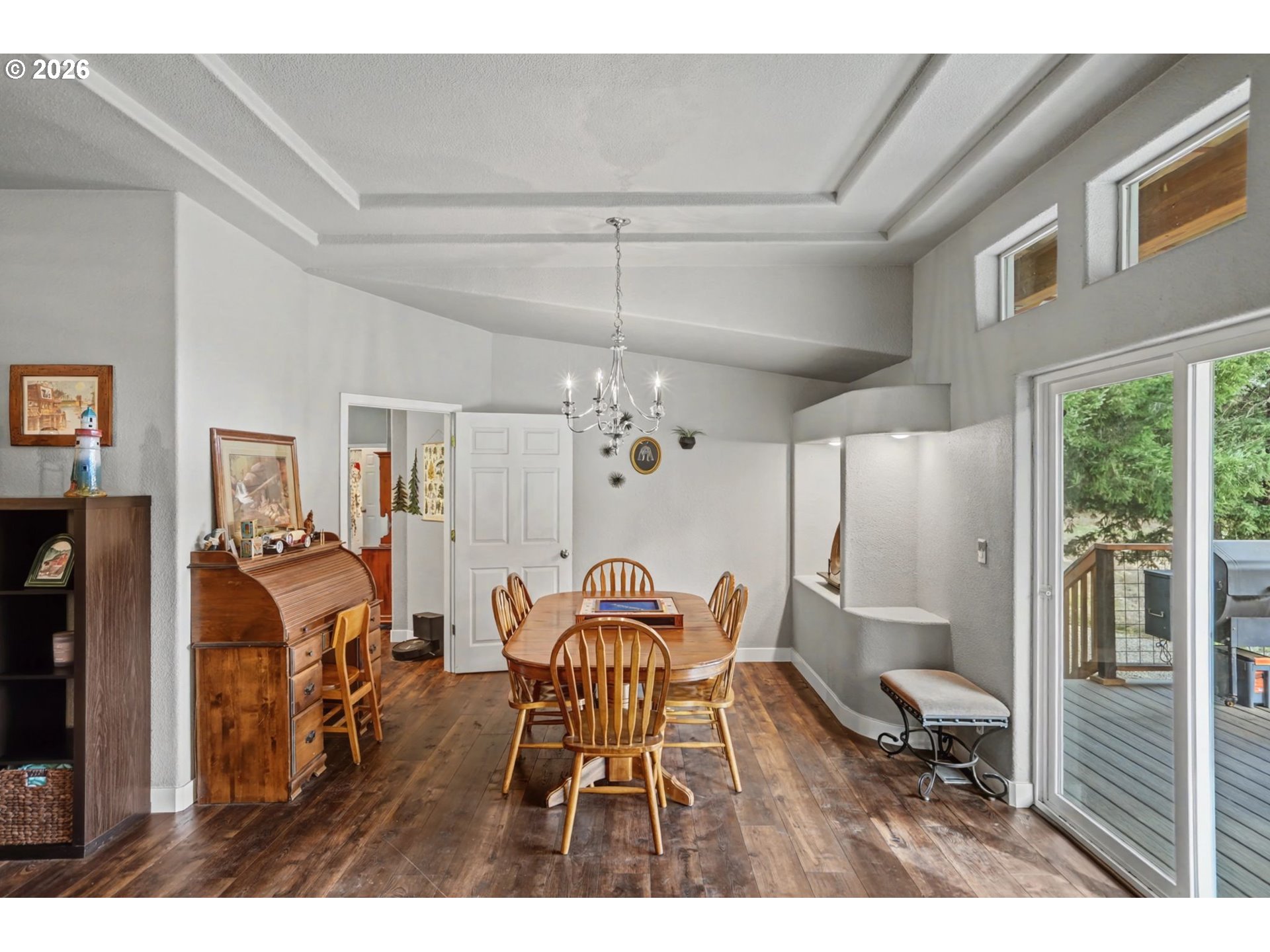 16310 Oakdale Road Dallas, OR 97338 - Photo 6 of 45 a dining room view with glass windows and chandelier