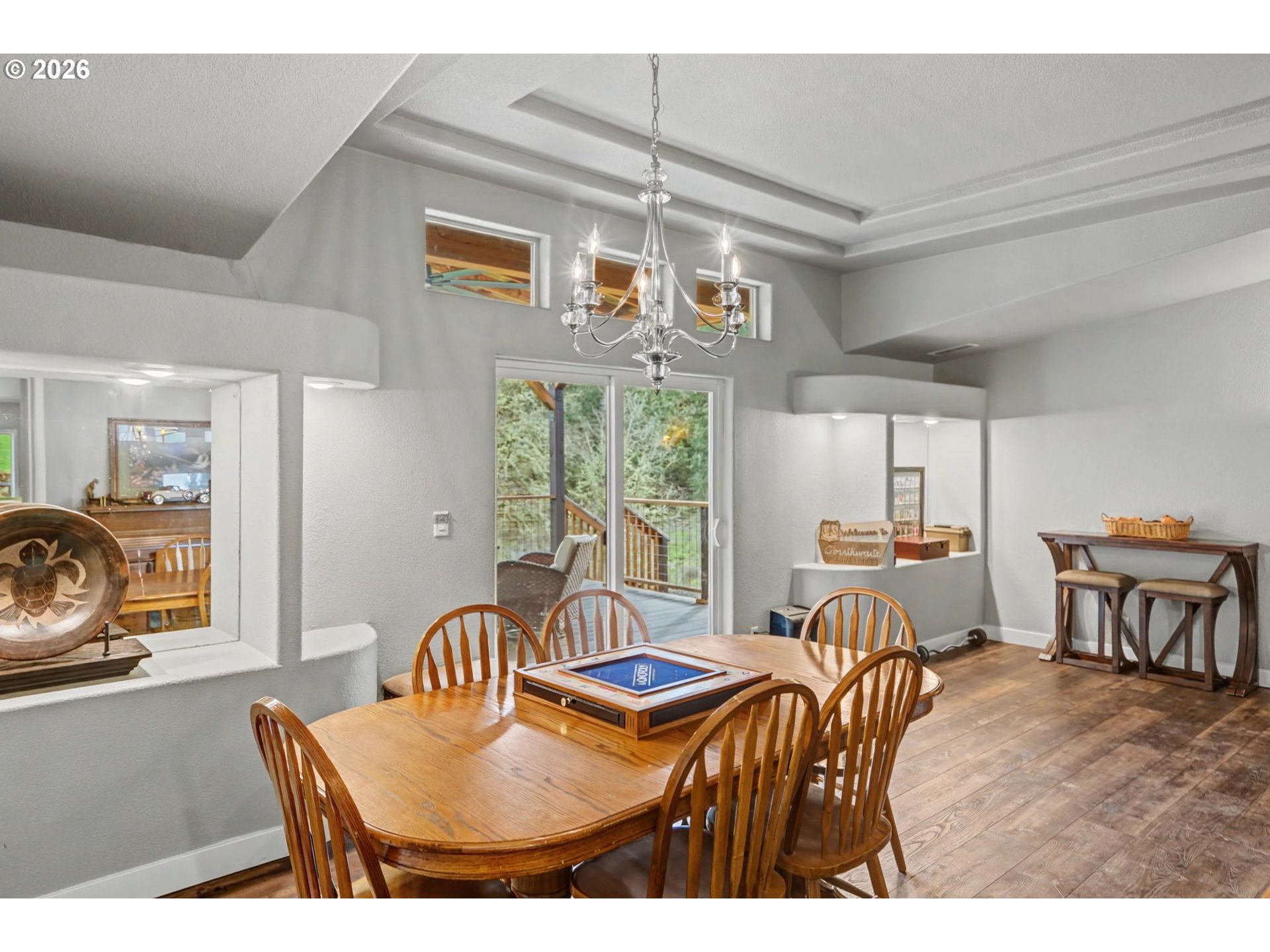 16310 Oakdale Road Dallas, OR 97338 - Photo 8 of 45 a dining room with furniture a chandelier and window