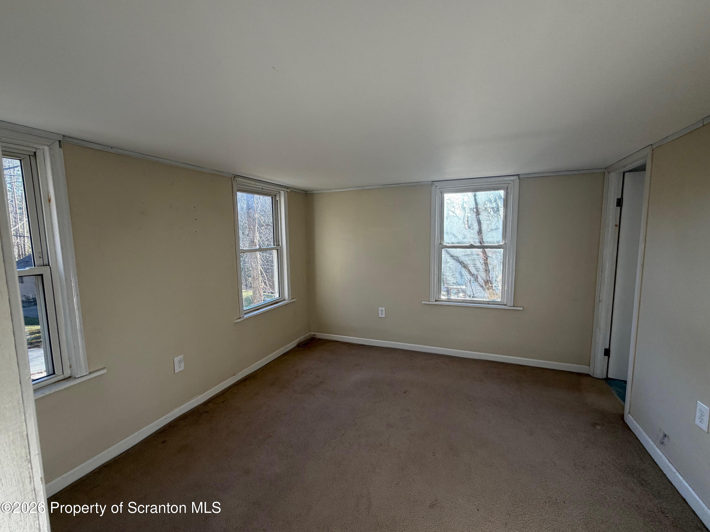 29 Maple Street Susquehanna, PA 18847 - Photo 9 of 9 an empty room with windows