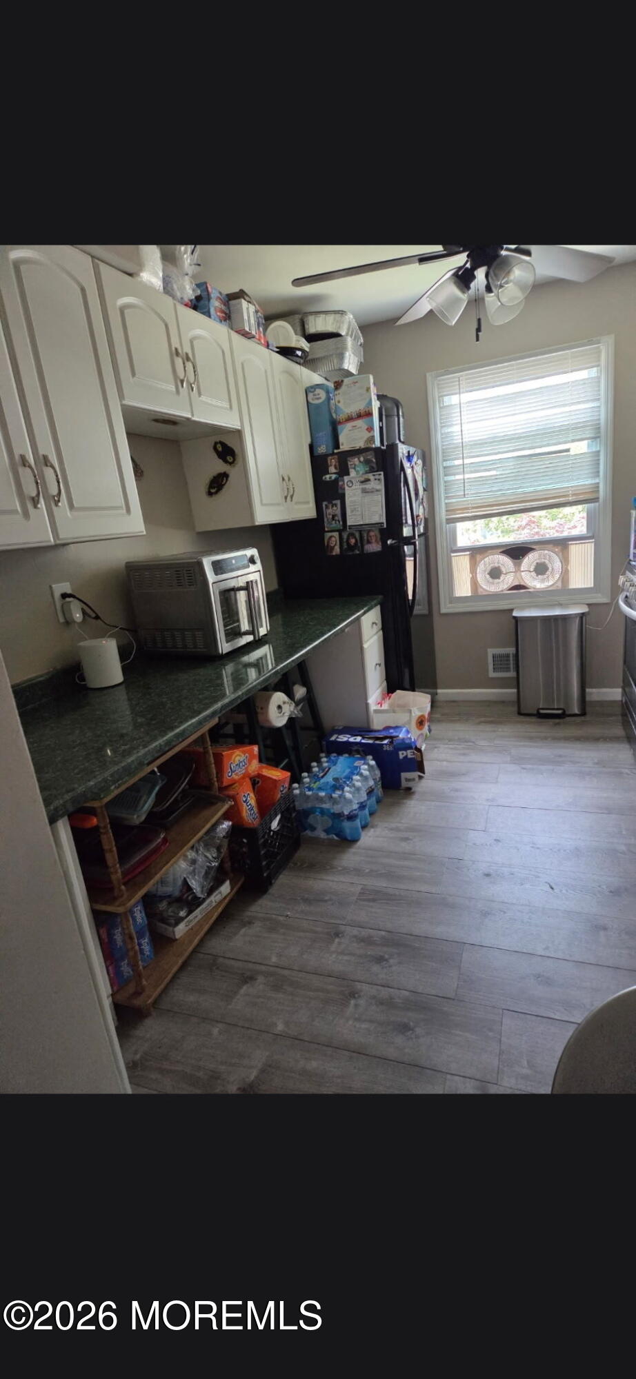 166 Sawmill Road, Unit 563 Brick, NJ 08724 - Photo 9 of 14 a room with gym equipment and a large window