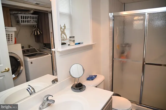 a view of a garden with lawn chairs