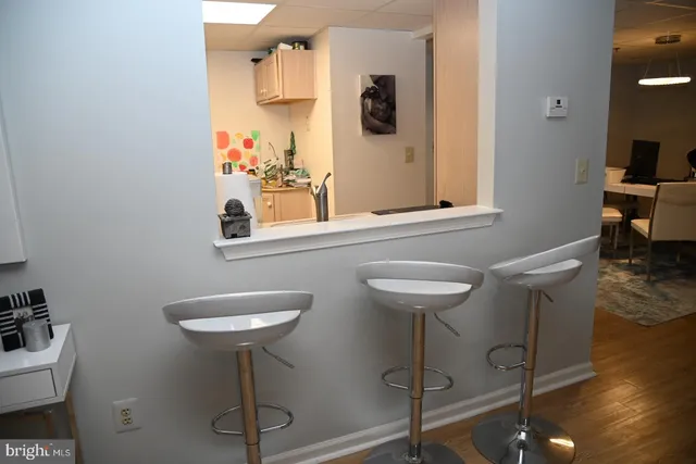 a kitchen with a sink and a window