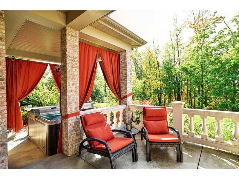 1114 Winnie Way Latrobe, PA 15650 - Photo 24 of 25 Patio/Deck. View of Hot Tub off terrace. Lovely drapes which will be replaced with blue ones. Perfect for privacy