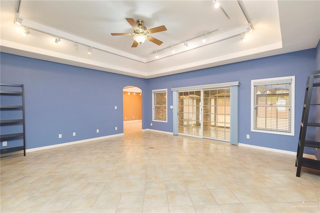 100 West Moore Road, Unit UT1 Pharr, TX 78577 - Photo 7 of 21 Living Room with view of Texas Room & Kitchen Entrance