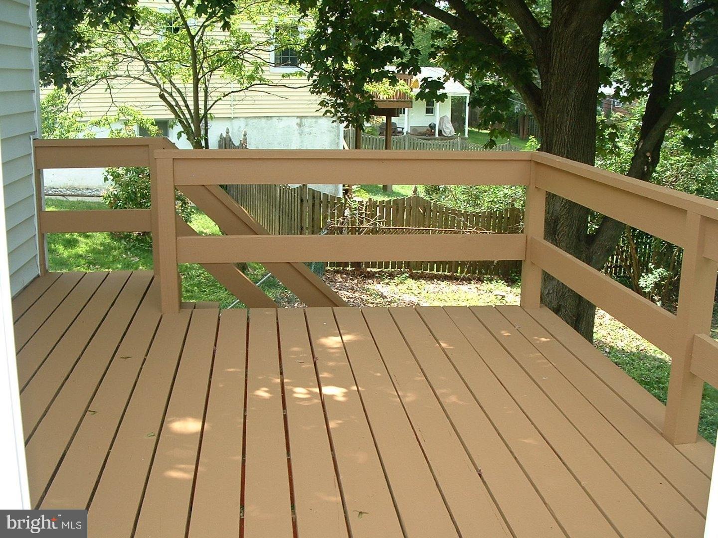 110 Barren Road Newtown Square, PA 19073 - Photo 13 of 15 a view of outdoor space with deck and large trees