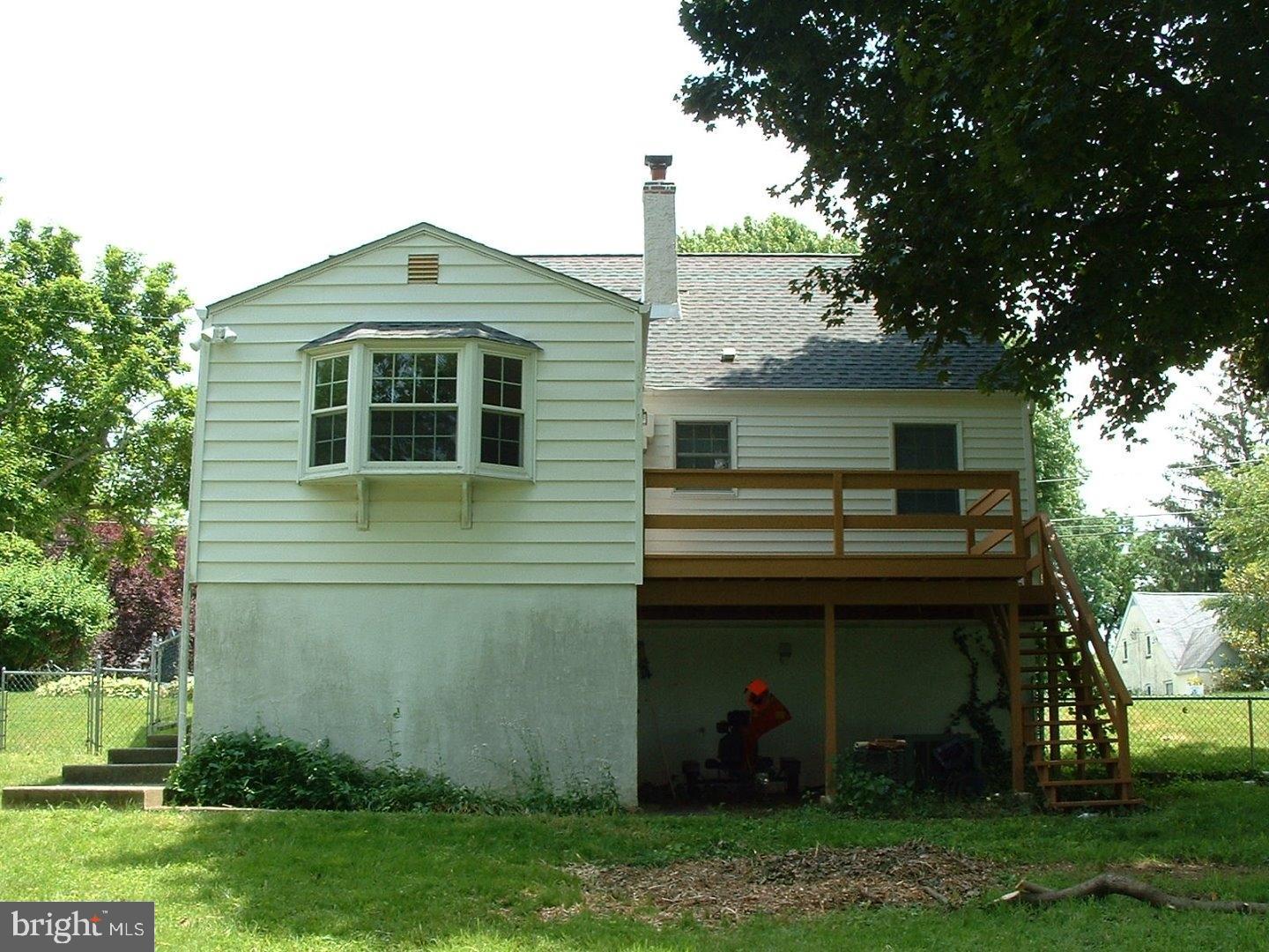 110 Barren Road Newtown Square, PA 19073 - Photo 15 of 15 a front view of a house with garden