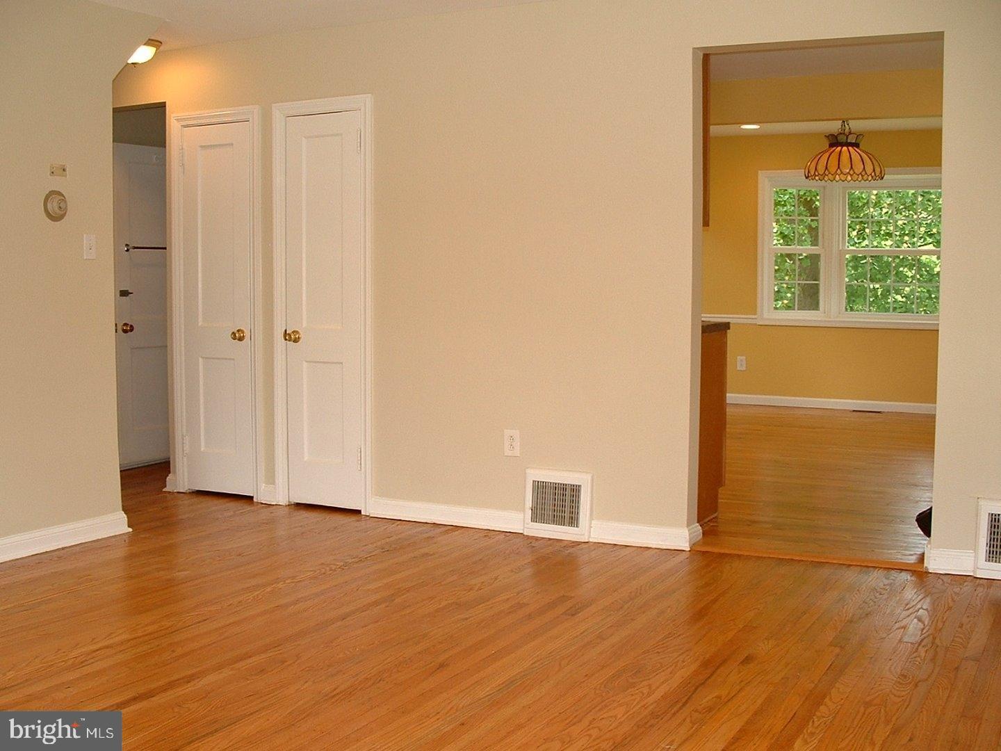 110 Barren Road Newtown Square, PA 19073 - Photo 5 of 15 a view of an empty room with wooden floor and a window