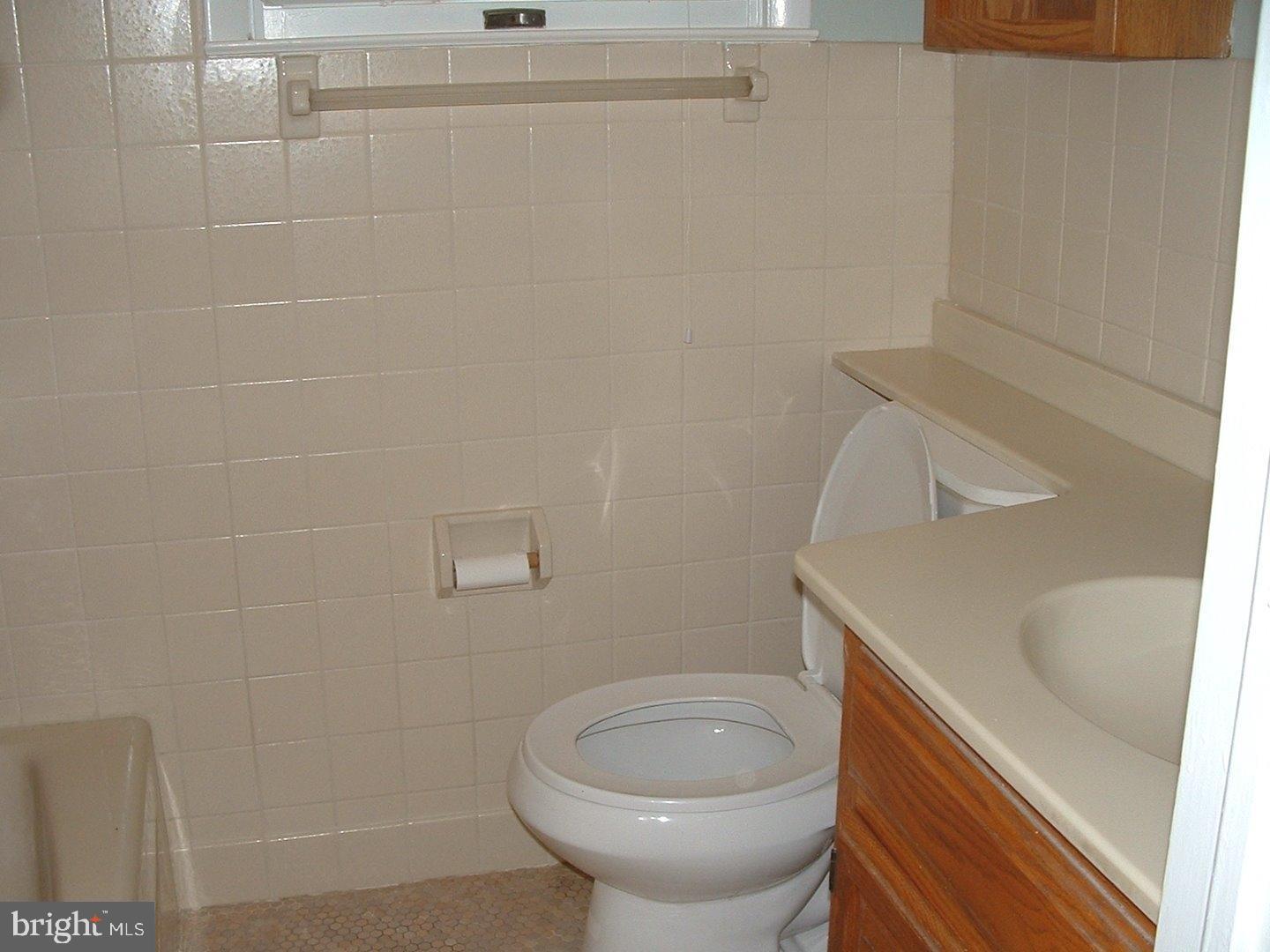 110 Barren Road Newtown Square, PA 19073 - Photo 7 of 15 a bathroom with a sink a toilet and tub