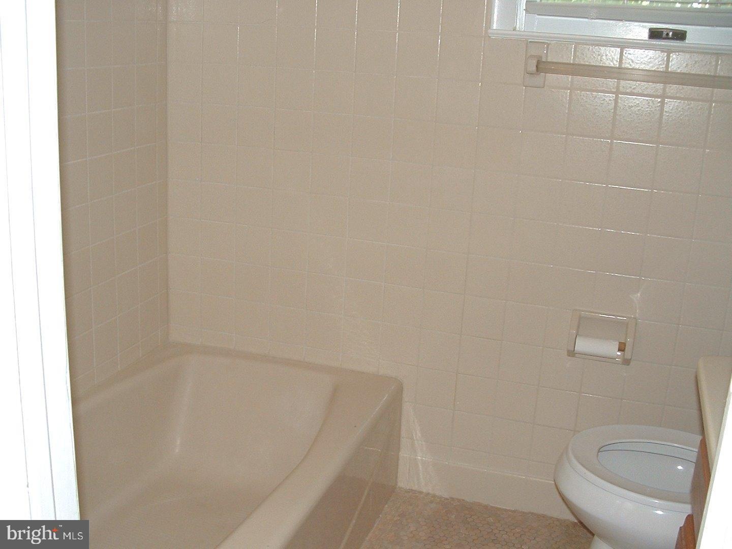 110 Barren Road Newtown Square, PA 19073 - Photo 8 of 15 a bathroom with a toilet and a shower