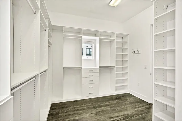 a view of an empty walk in closet