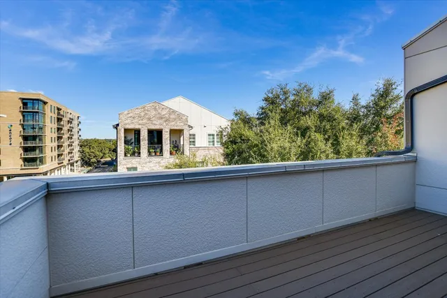 a view of a large building with a balcony