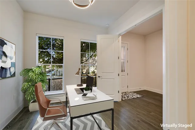 a workspace with furniture and window