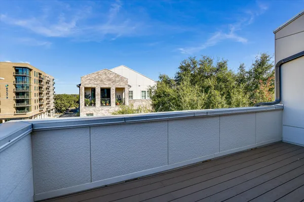 a view of swimming pool with a patio