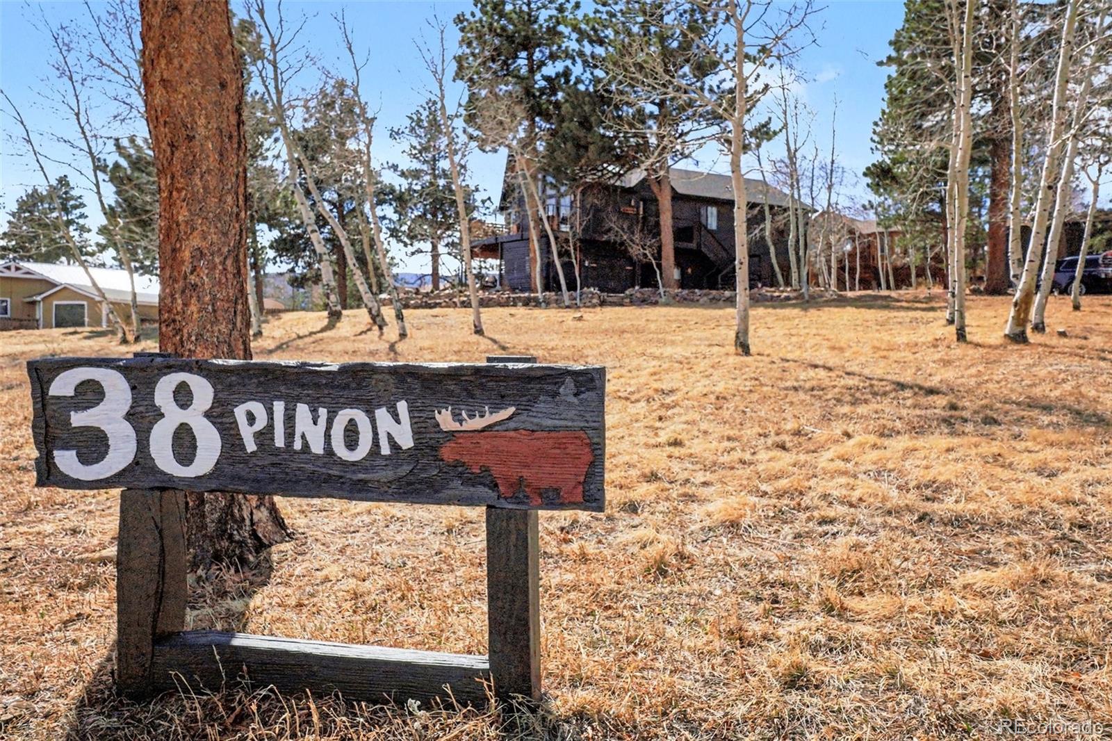 38 Pinon Road Bailey, CO 80421 - Photo 21 of 26 a view of street sign board
