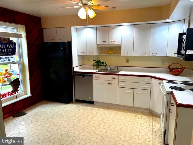 a bathroom with a sink and toilet