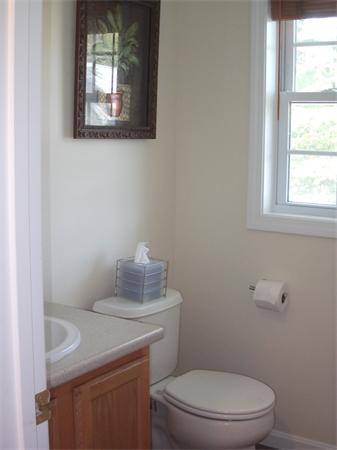 19 Ingersoll Road Billerica, MA 01821 - Photo 16 of 23 a bathroom with a toilet sink and mirror