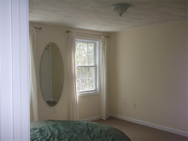 19 Ingersoll Road Billerica, MA 01821 - Photo 19 of 23 an entryway with window and mirror