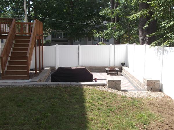 19 Ingersoll Road Billerica, MA 01821 - Photo 22 of 23 a view of a patio with table and chairs with wooden floor and fence