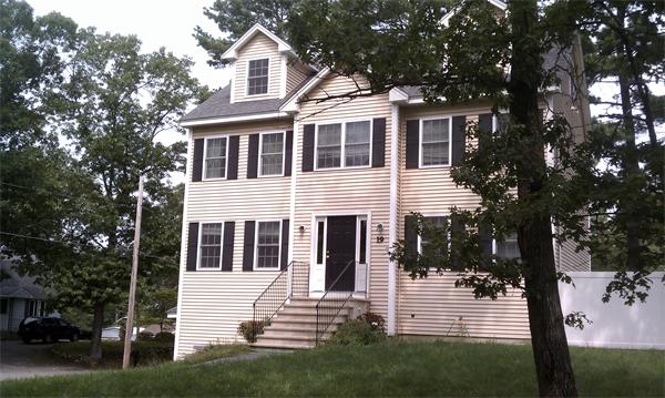 19 Ingersoll Road Billerica, MA 01821 - Photo 3 of 23 a front view of a house with a yard