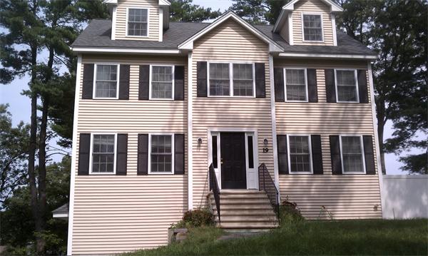 19 Ingersoll Road Billerica, MA 01821 - Photo 4 of 23 a house that has lot of windows on it