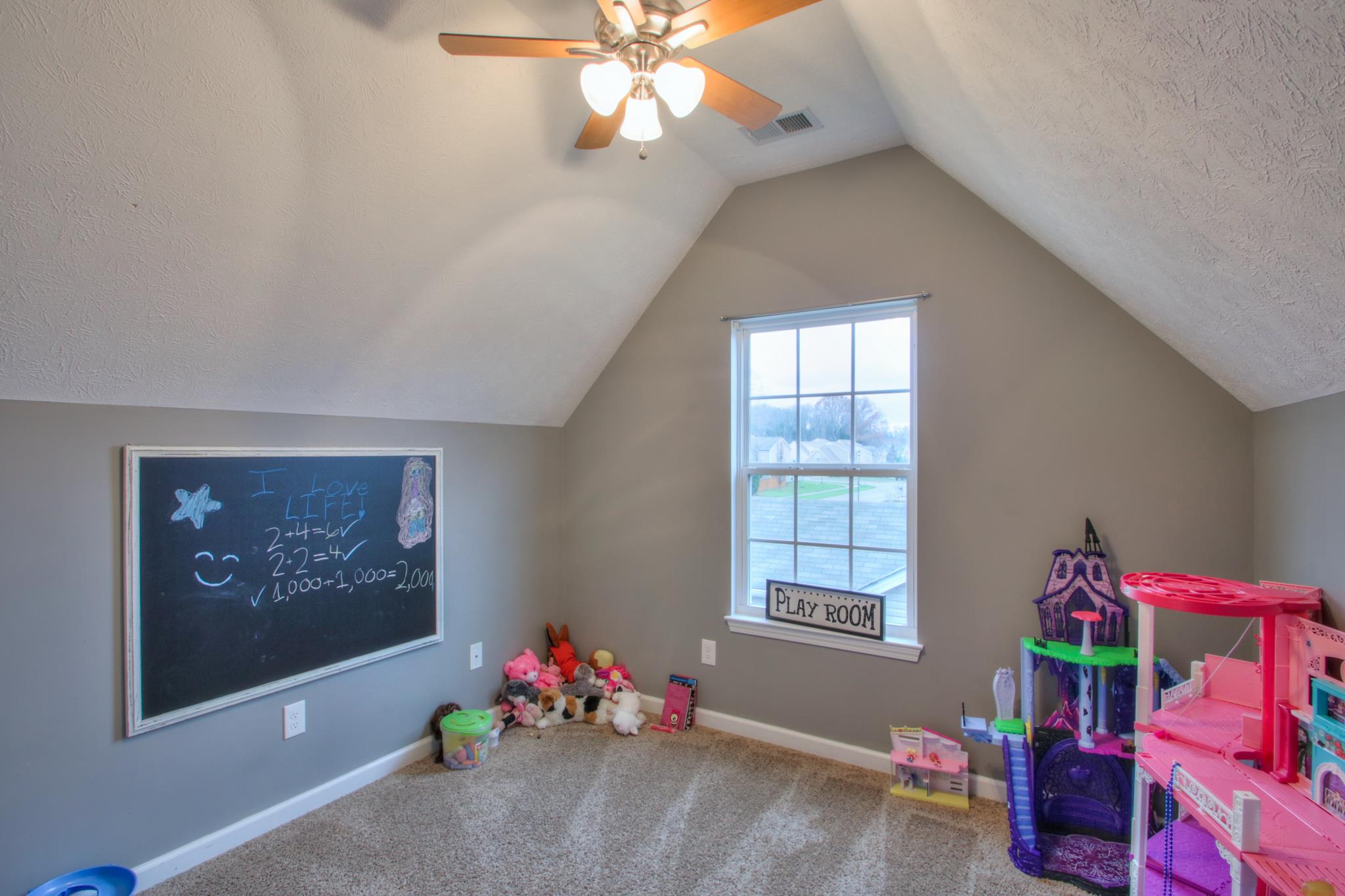 1209 Woodall Road Lebanon, TN 37090 - Photo 23 of 28 a living room with furniture and a window