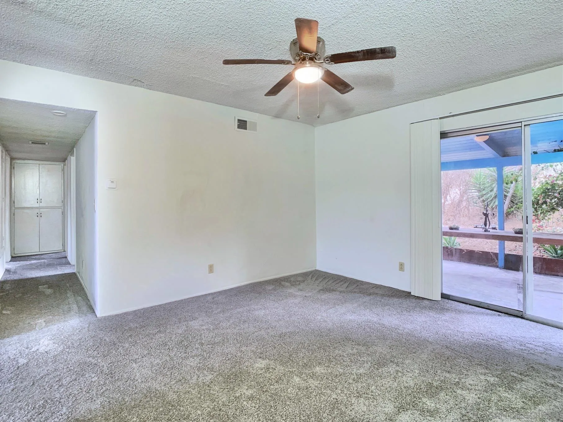 10111 Norte Mesa Drive Spring Valley, CA 91977 - Photo 11 of 29 an empty room with a ceiling fan and window