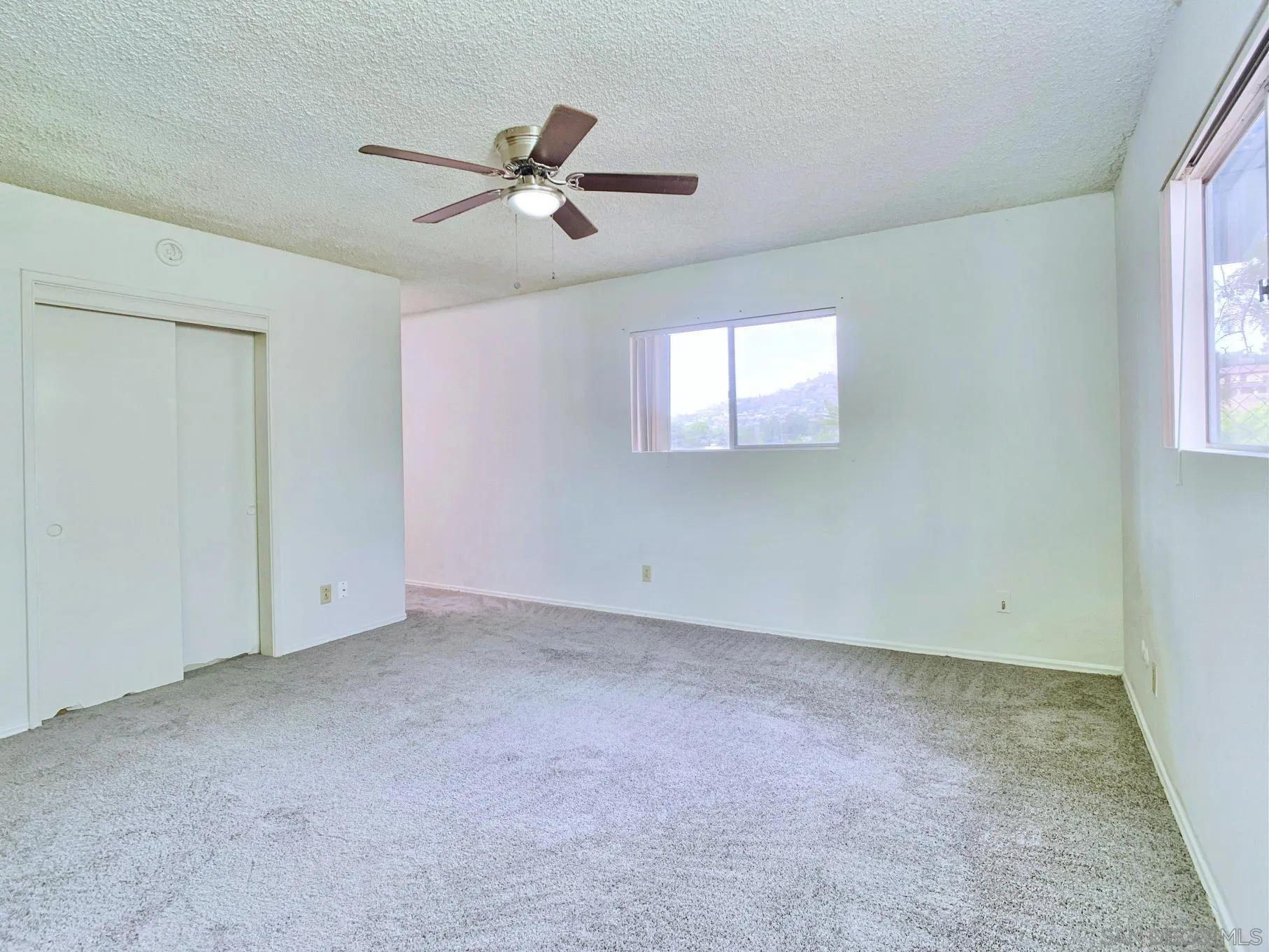 10111 Norte Mesa Drive Spring Valley, CA 91977 - Photo 20 of 29 a view of an empty room with a window