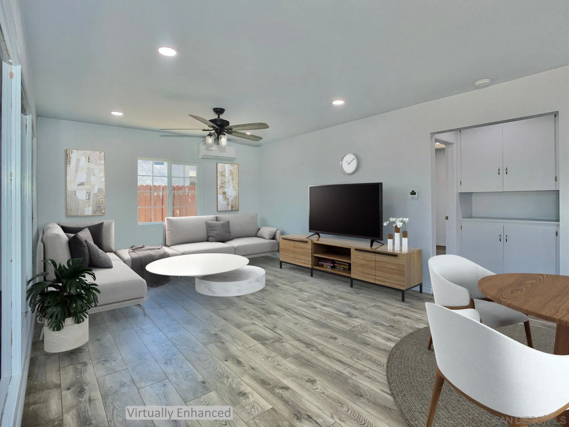 10111 Norte Mesa Drive Spring Valley, CA 91977 - Photo 29 of 29 a living room with furniture and a flat screen tv