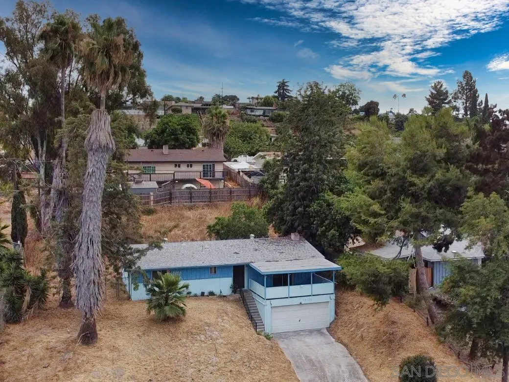 10111 Norte Mesa Drive Spring Valley, CA 91977 - Photo 3 of 29 a view of a houses with a yard