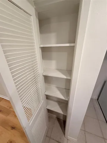 a view of a room with rack on the wall