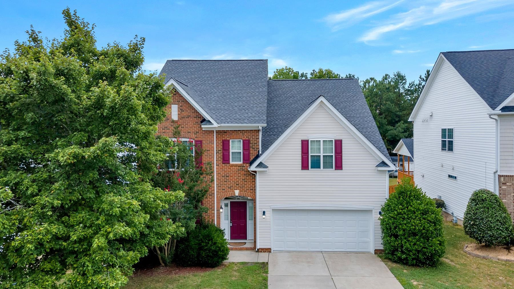 6316 Sparkling Brook Drive Raleigh, NC 27616 - Photo 2 of 44 a view of house with garden